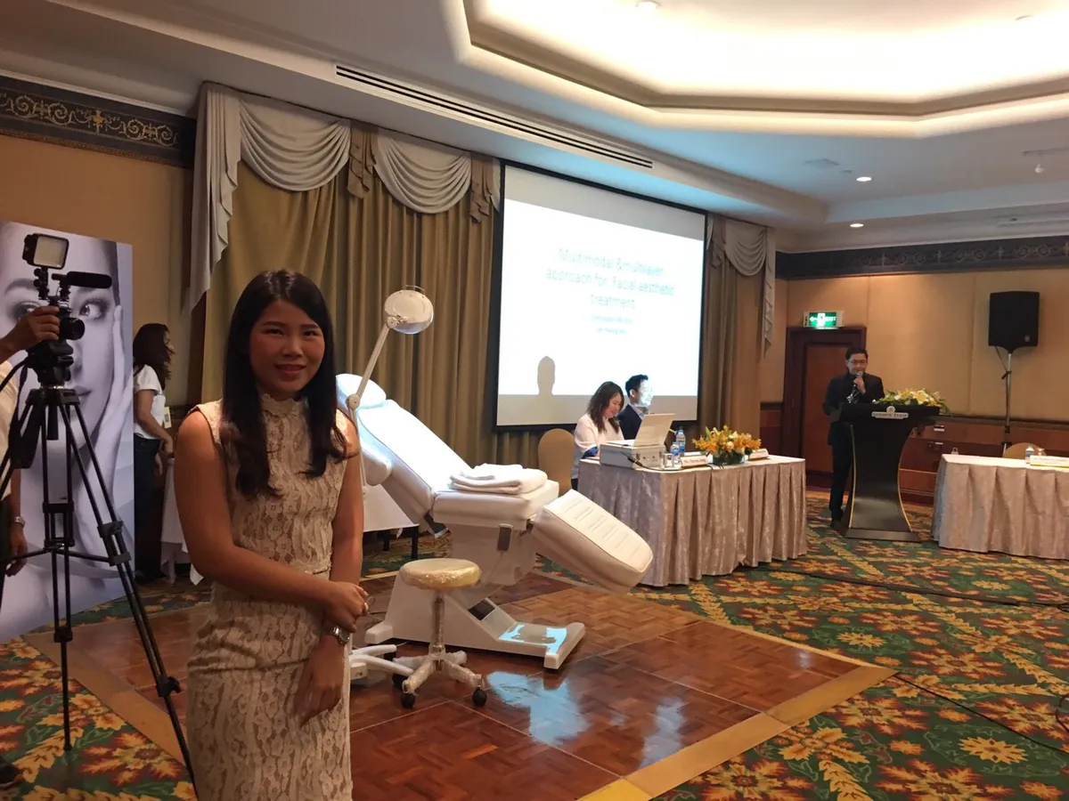 Dr. Waleerat beside the demonstration area at the 2017 LDK workshop in Bangkok